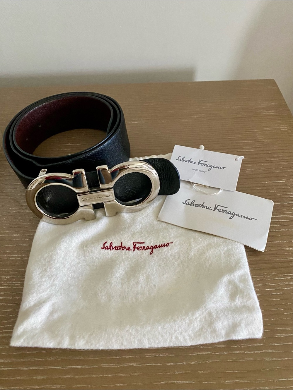 Salvatore Ferragamo Black Belt with Silver Gancini Buckle and Burgundy Interior